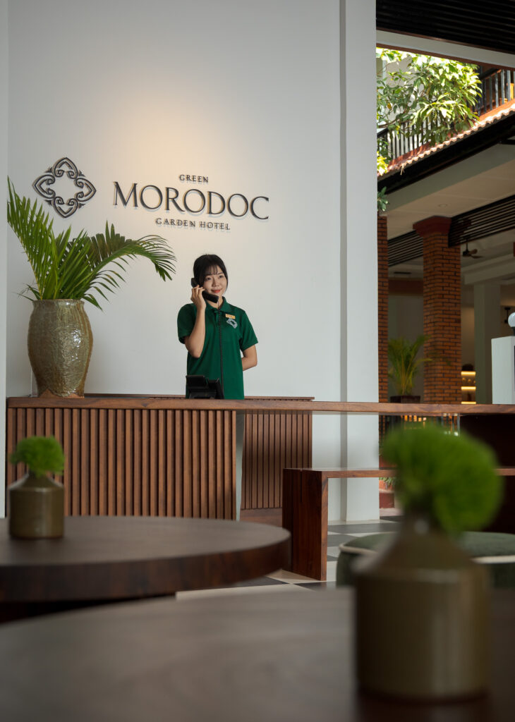 staff member at hotel reception